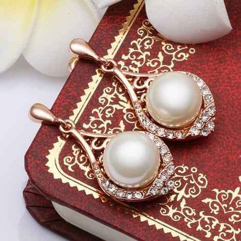 Buy Sukkhi Exclusive Crystals from Swarovski Dangler Gold Plated Dangle Earring for Women and Girls - Purplle