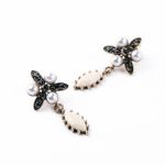 Buy Bling Bag Flower Pearl Drop Earrings - Purplle