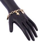Buy Crunchy Fashion Multi charms golden bracelet - Purplle