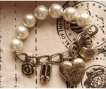 Buy Crunchy Fashion Valentine Special Heart and Pearl Charm Bracelet - Purplle