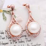 Buy Sukkhi Exclusive Crystals from Swarovski Dangler Gold Plated Dangle Earring for Women and Girls - Purplle