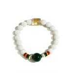 Buy Golden Peacock Fluted Giant Clam elastic thred Bracelets - Purplle