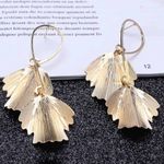 Buy Ferosh Orchid Leaf Twisted Drop Earrings - Purplle