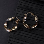 Buy Queen Be Glowy Twist Earrings - Purplle