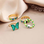 Buy Jewels Galaxy Set Of 4 Gold-Plated Enamelled Design Finger Ring - Purplle