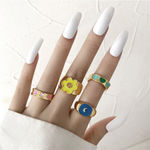 Buy Jewels Galaxy Set Of 4 Gold-Plated Multi-Coloured Enamelled Design Finger Ring - Purplle