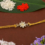 Buy Estele Gold Plated Ornamental Flower Rakhi with Austrian Crystals and Fancy Silk Thread - Purplle