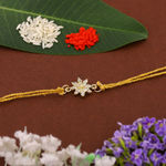 Buy Estele Gold Plated Ornamental Flower Rakhi with Austrian Crystals and Fancy Silk Thread - Purplle