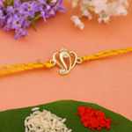 Buy Estele Gold Plated Aadi Dev Rakhi with Austrian Crystals and Fancy Silk Thread - Purplle