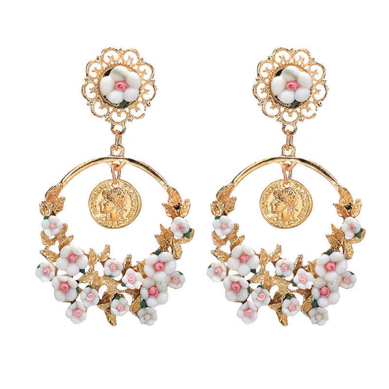 Buy Crunchy Fashion Statement Clay Flower Earrings - Purplle