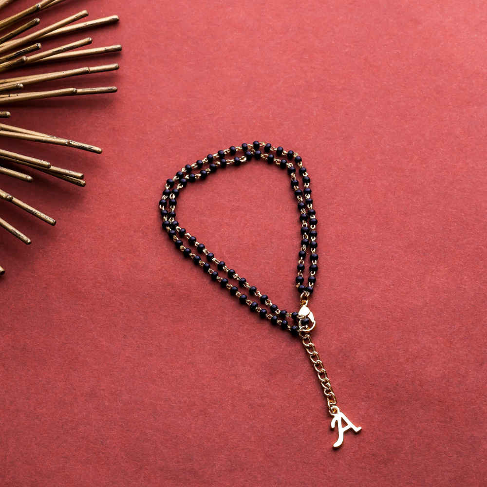 Buy Estele Gold Plated Fascinating "A" Alphabet with Black Beads Bracelet for Women - Purplle