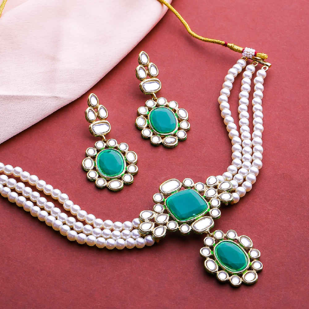 Buy Estele Gold Plated Aesthetic Pearl Jewellery Set with Green Emerald Stone for Women - Purplle