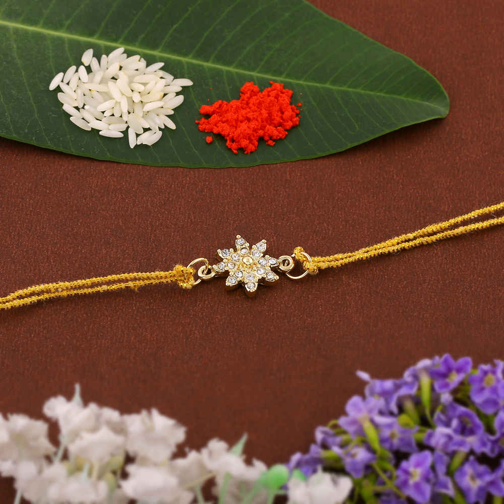 Buy Estele Gold Plated Ornamental Flower Rakhi with Austrian Crystals and Fancy Silk Thread - Purplle