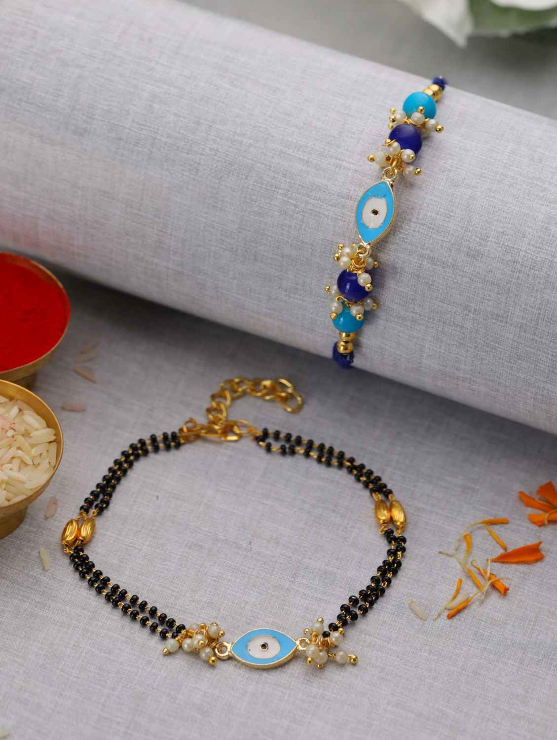 Buy Jazz And Sizzle Set of 2 Round Shaped Blue Evil Eye Bhaiya Bhabhi Rakhi - Purplle