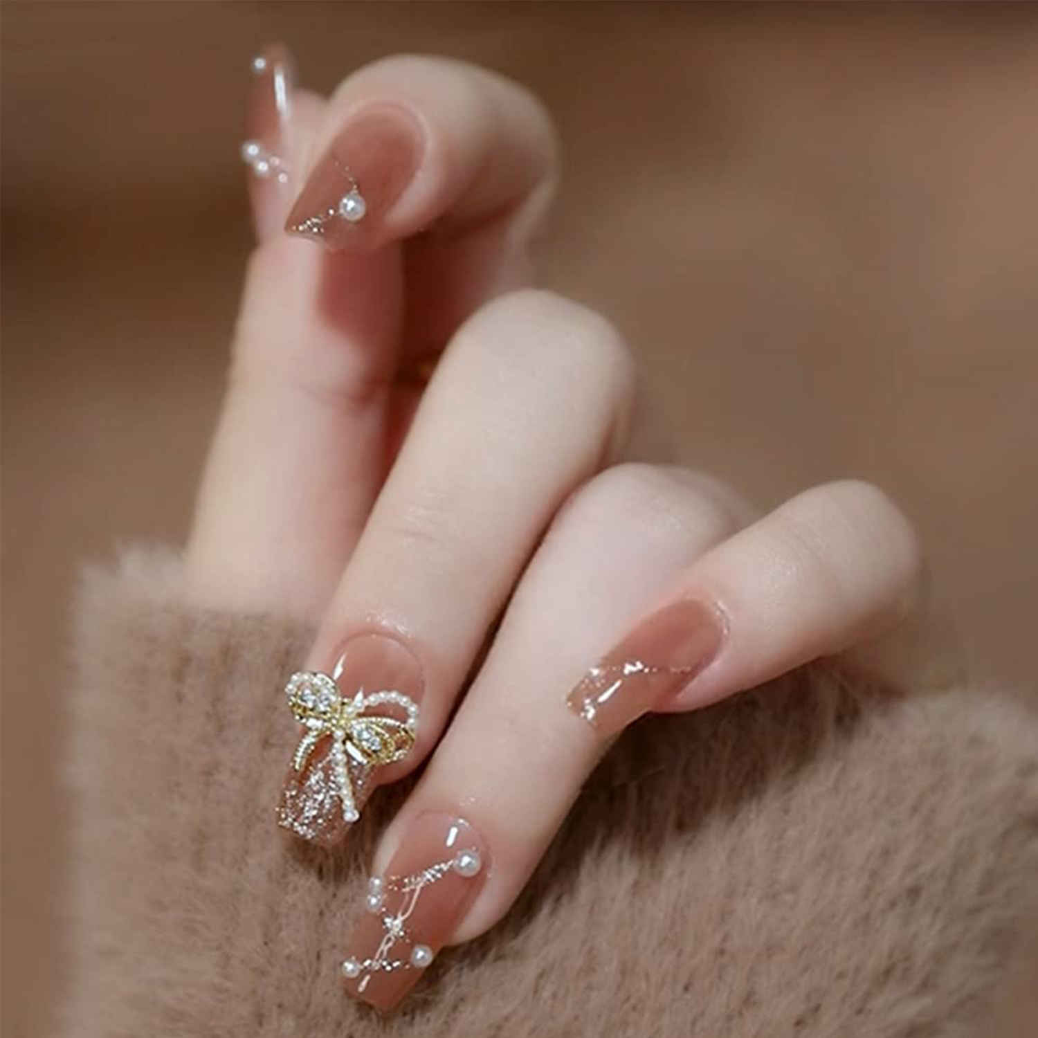Buy Secret Lives artificial fake false press on nails nude color with white pearls & silver glitter with 3d bow design 24 Pc - Purplle