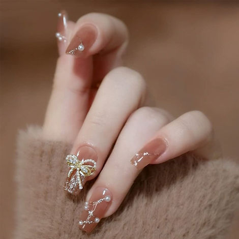 Buy Secret Lives artificial fake false press on nails nude color with white pearls & silver glitter with 3d bow design 24 Pc-Purplle