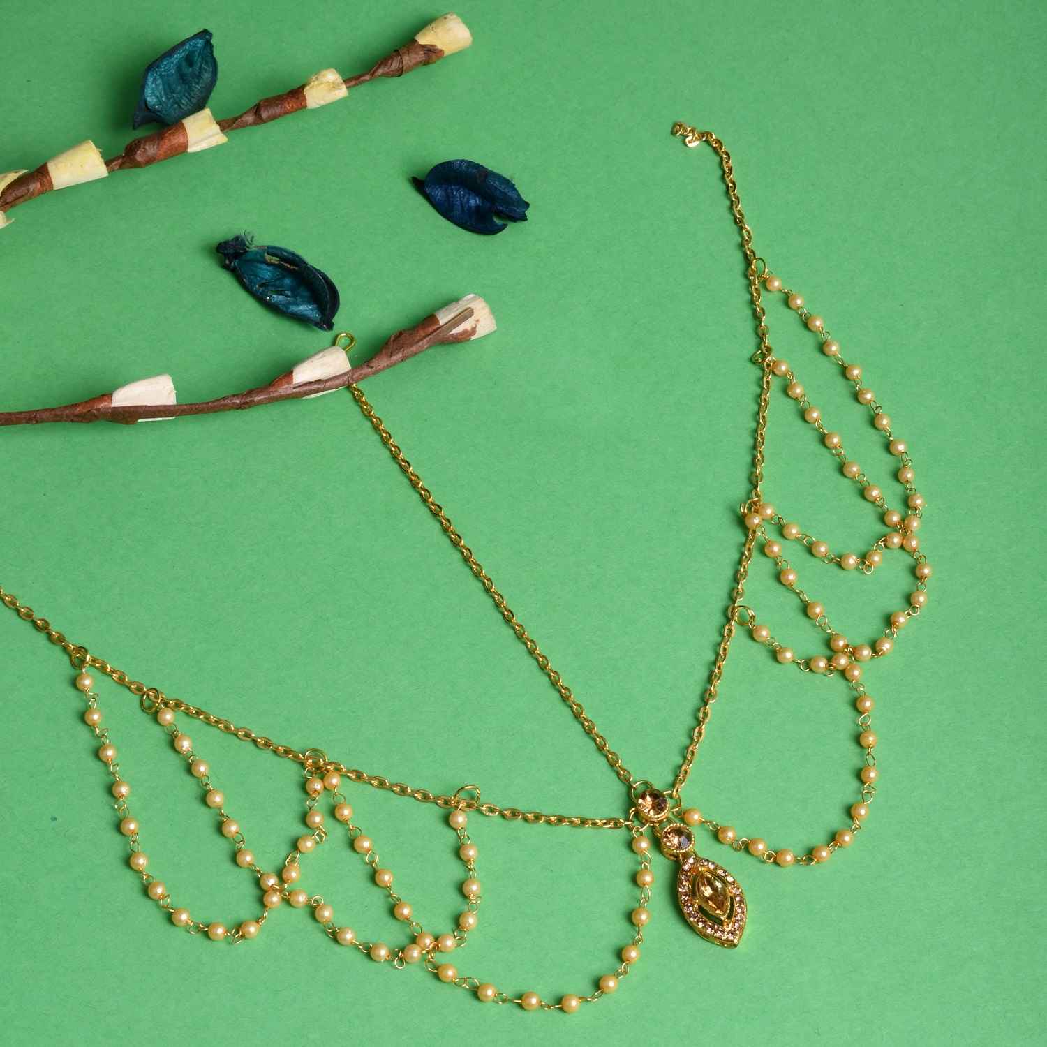Buy Steorra Jewels Golden Stoned Multi String Pearl Maangpatti - Purplle