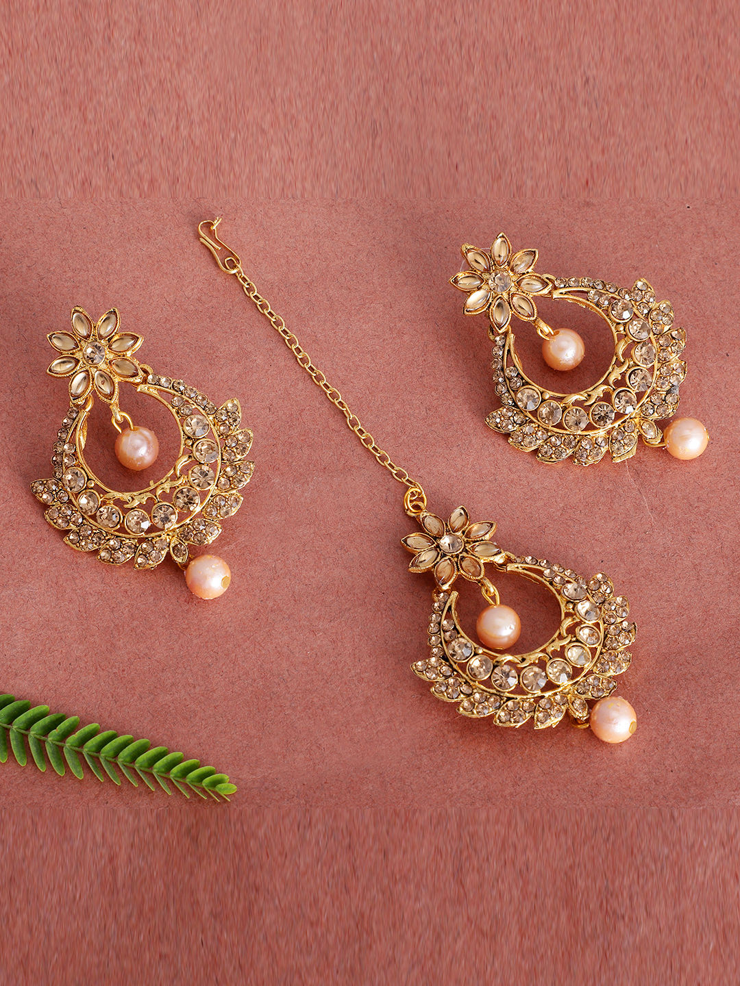 Buy Crunchy Fashion Gold -Plated Stone studded Earrings & Mangtika ...