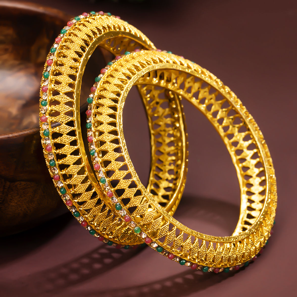 Gold plated bangles sales for women by sukkhi
