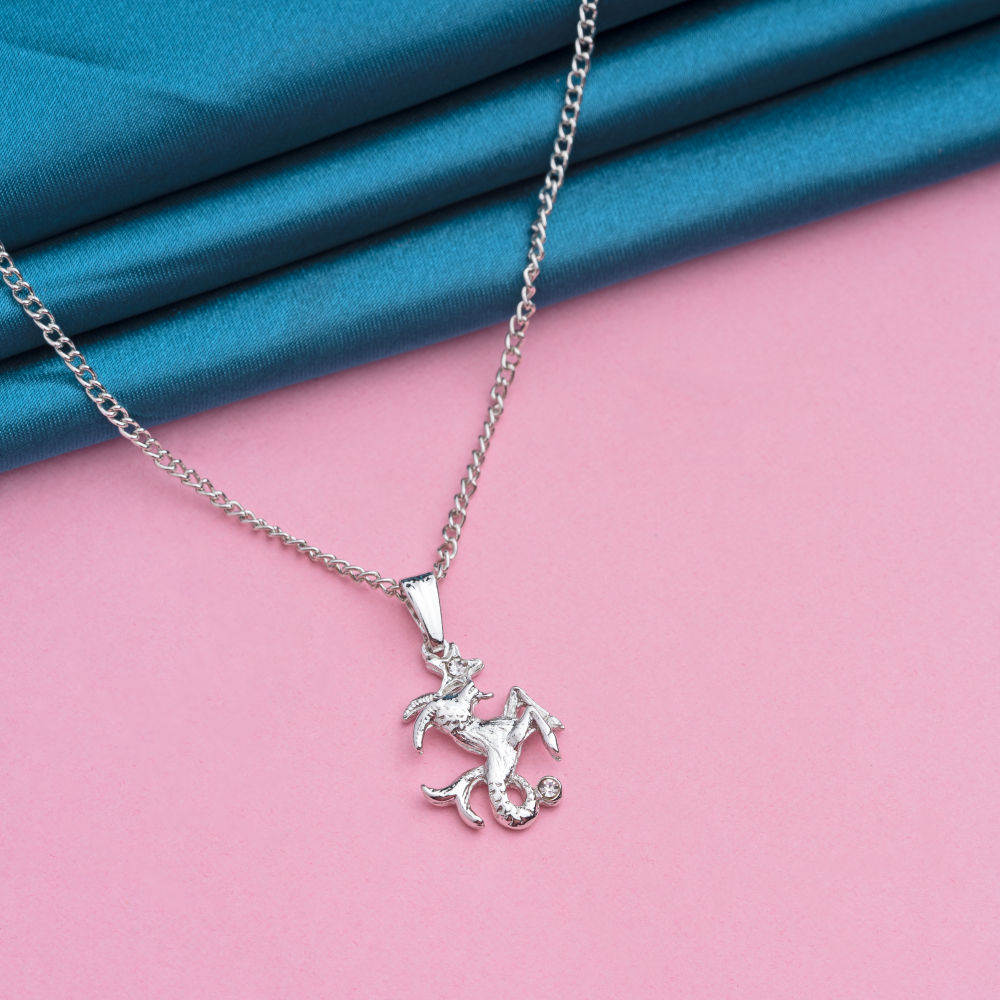 Silver capricorn pendant deals