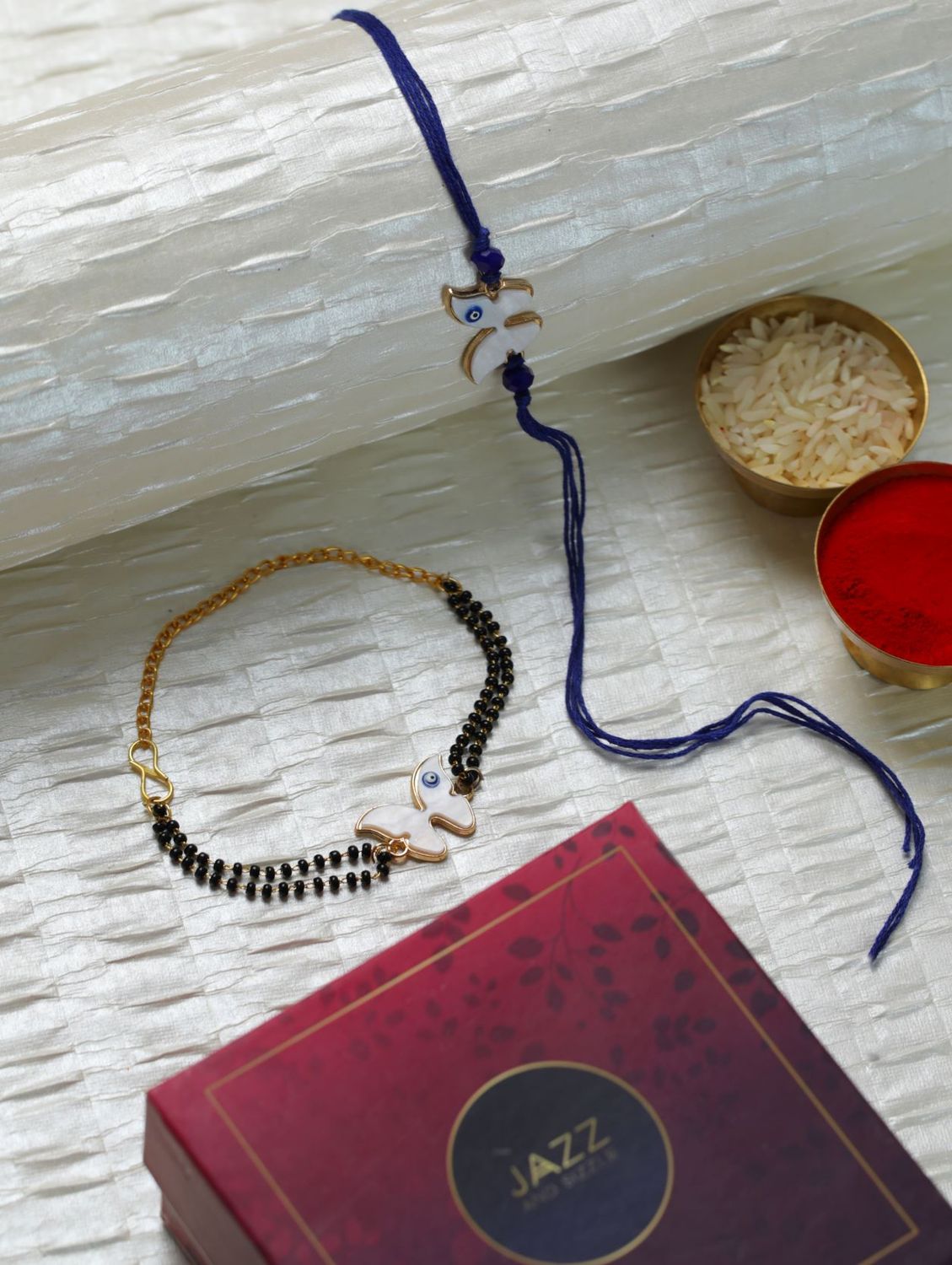 Jazz And Sizzle Set of 2 Butterfly Shaped Evil Eye Designer Rakhi